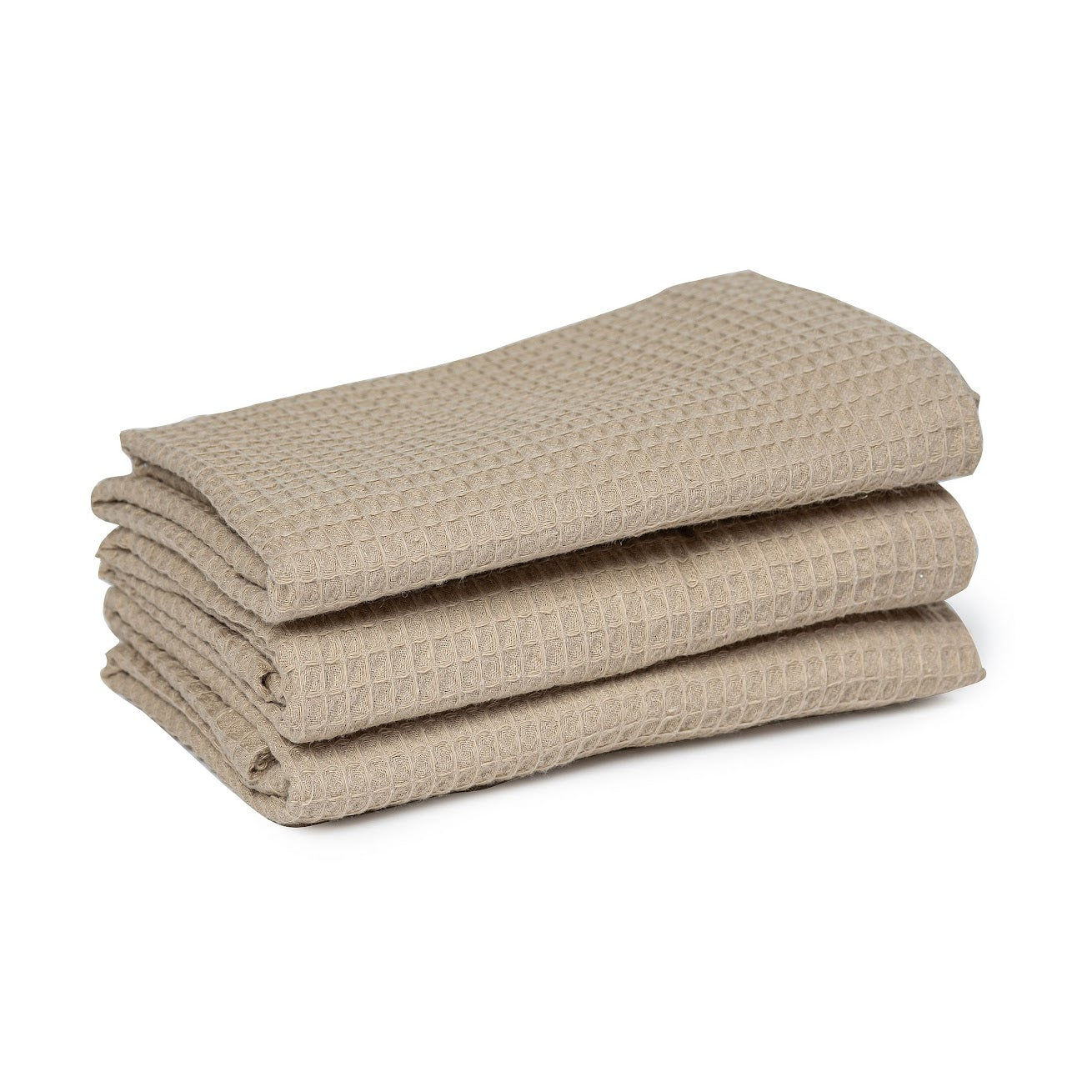 שלושה מגבות ידיים מקופלות של Fine Lab Home - 3 יחידות בצבע בז' באריגה וופל, עשויות מ-100% כותנה, מוערמות על רקע לבן.