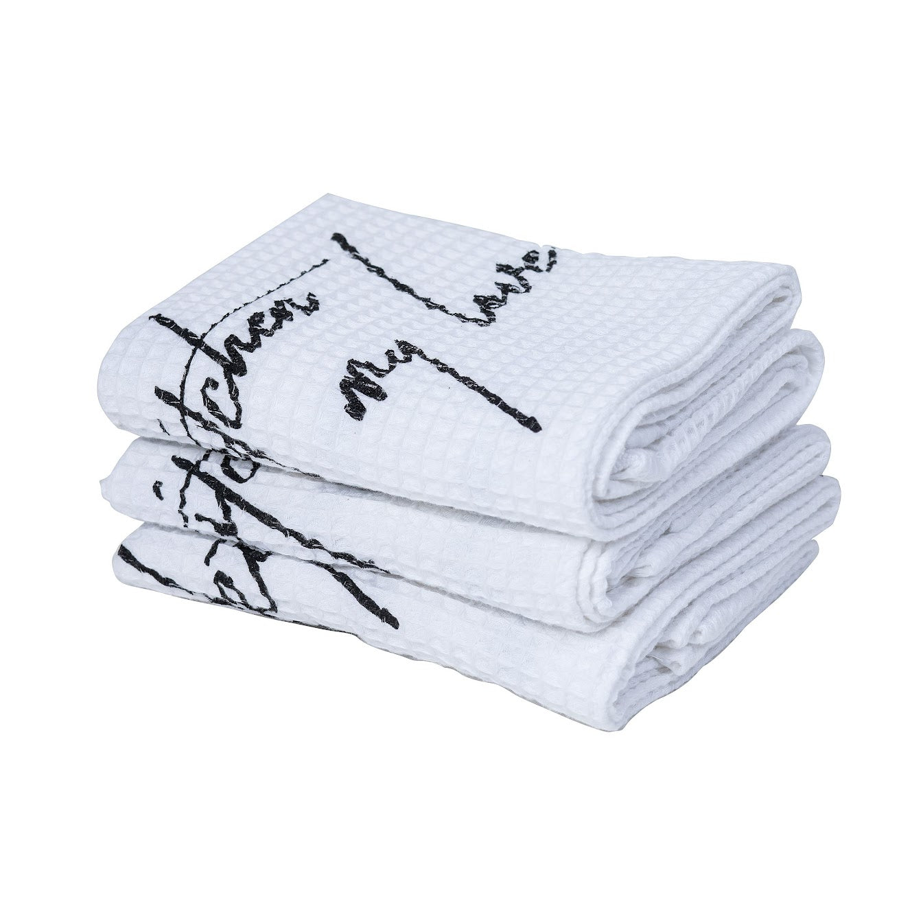 שלוש מגבות מטבח לבנות מבית Fine Lab Home, עם מרקם וופל וכיתוב שחור בכתב יד, מוערמות זו על גבי זו. מיוצרות בישראל מ-100% כותנה.